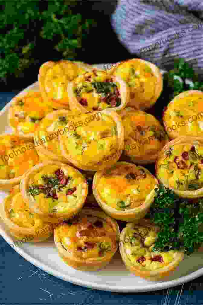 A Tray Of Golden Brown Mini Quiches, Each With A Different Filling. Snacks And Appetizers:: Appetizers Snacks And Dips For Any Occasion